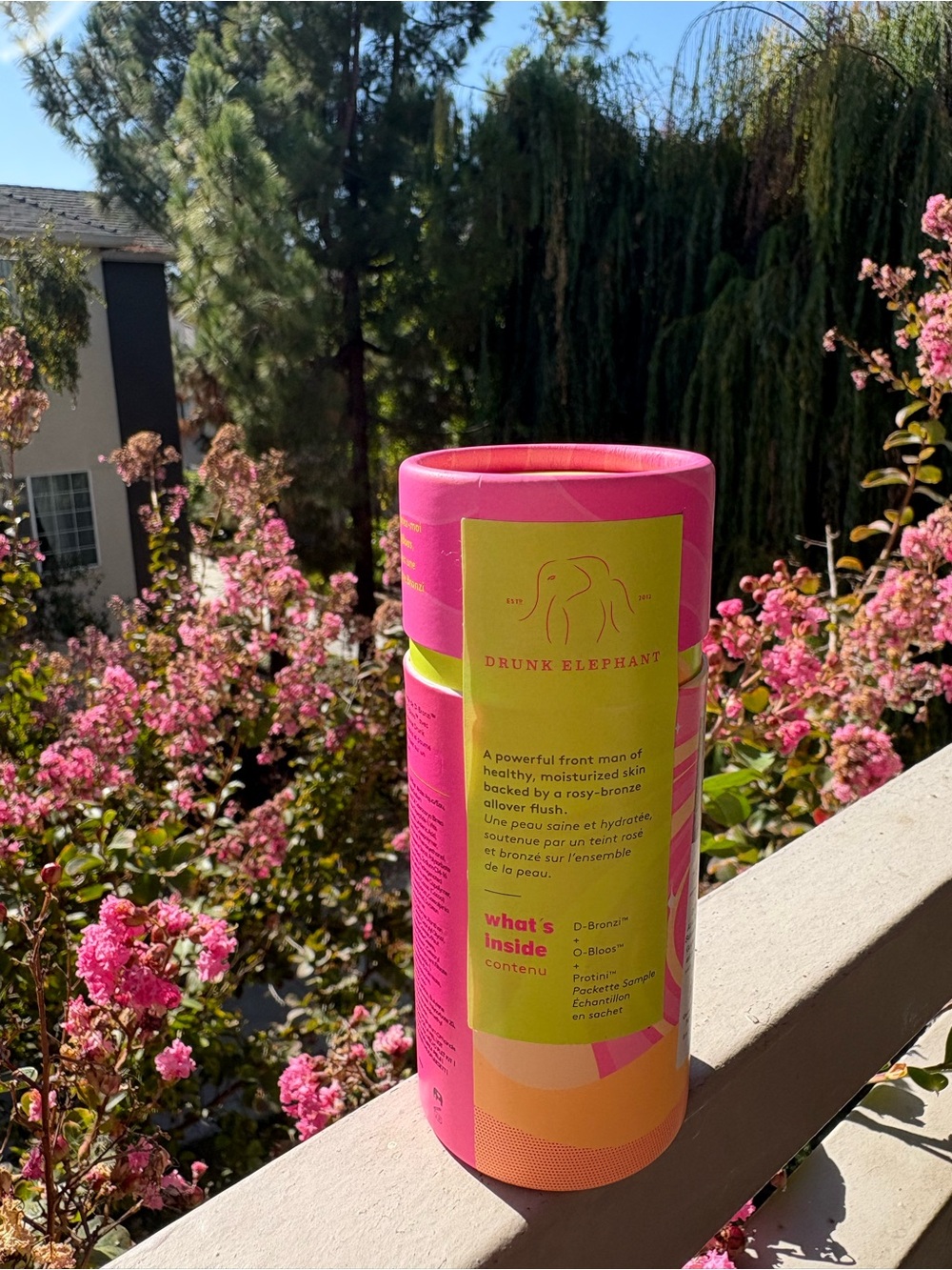 Drunk Elephant Pink and Yellow Cylindrical Body Care Set